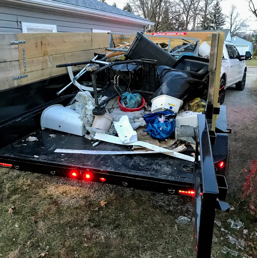 Roll-off dumpster delivered to a residential driveway in Shakopee