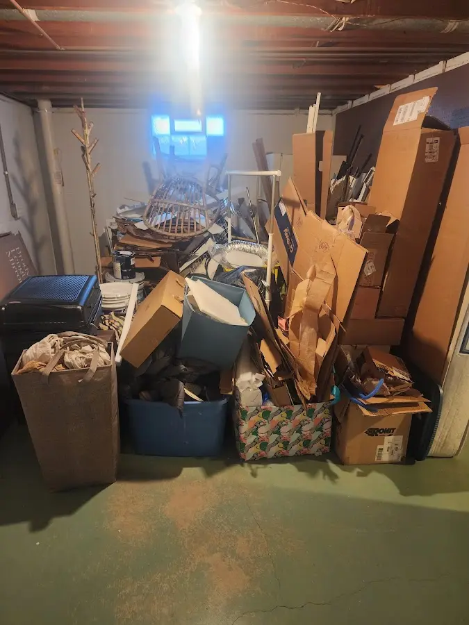 Roll-off dumpster container at job site for 2 Yard Dumpster Rental in Shakopee